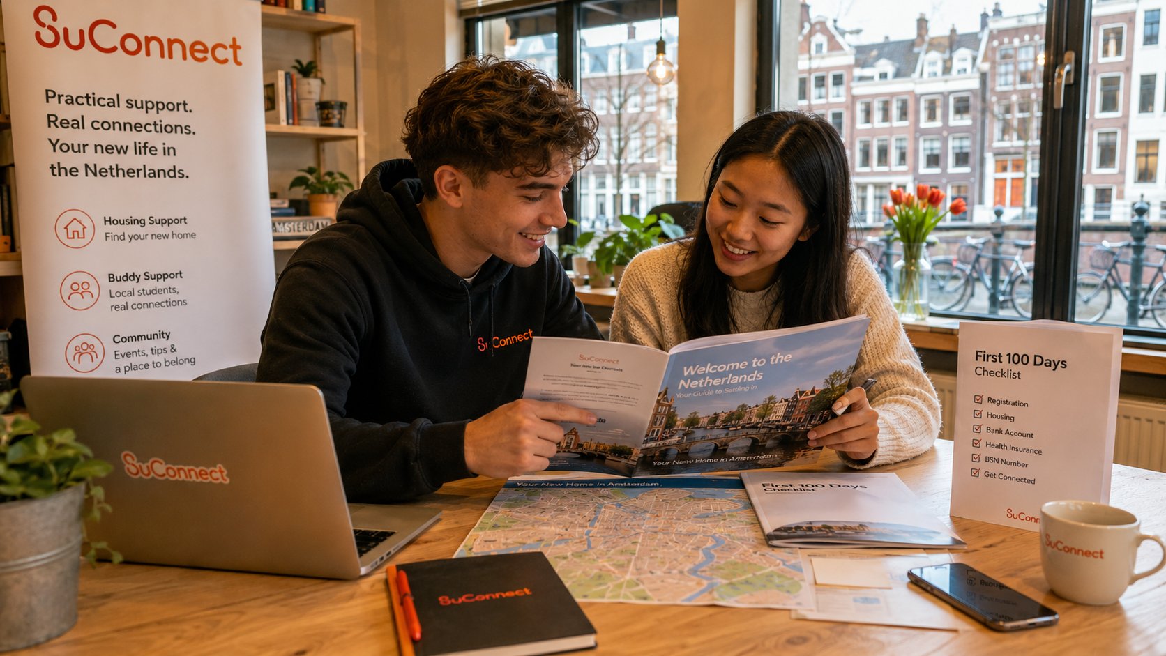 Buddy sessie Amsterdam — twee studenten bekijken SuConnect-gids samen